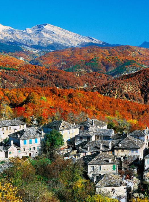 top of a mountain with a small village beneath